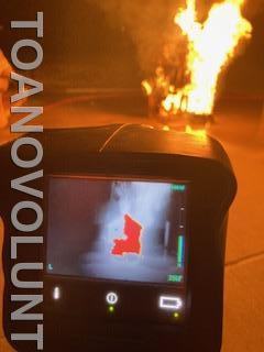 The view of a fire through a thermal imaging camera.